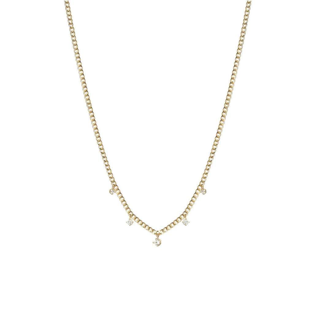 Zoe Chicco gold necklace with 5 dangling diamonds, front view