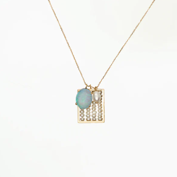 Wwake gold necklace with pearl and opal pendants, front view
