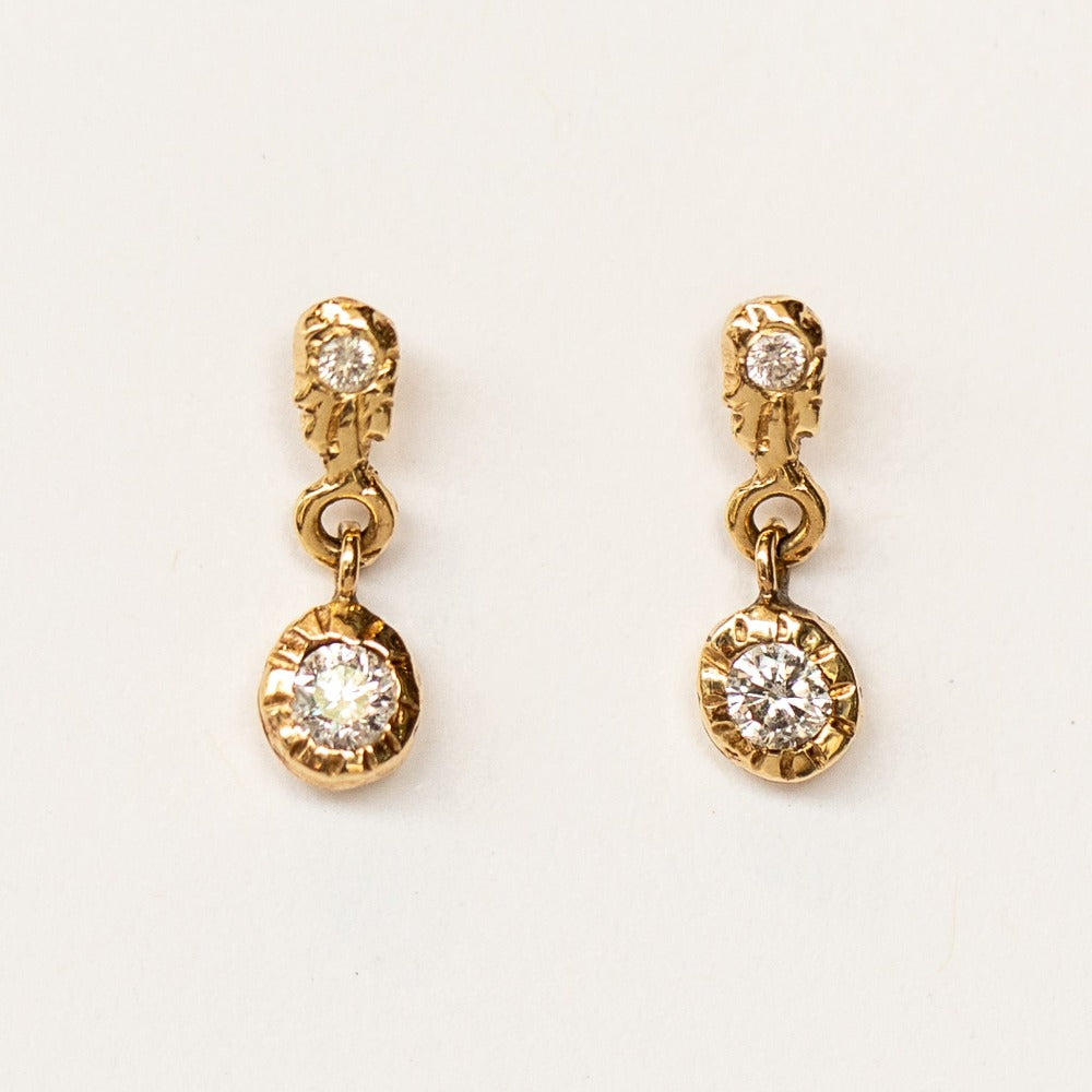 Dainty diamond drop earrings in yellow gold from Communion by Joy.