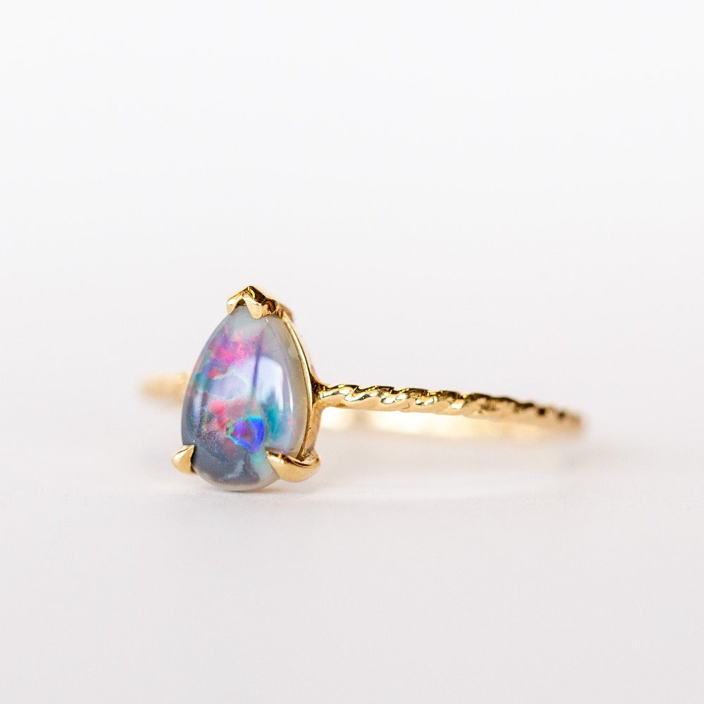 Pear Blue Flash Opal Twist Ring
