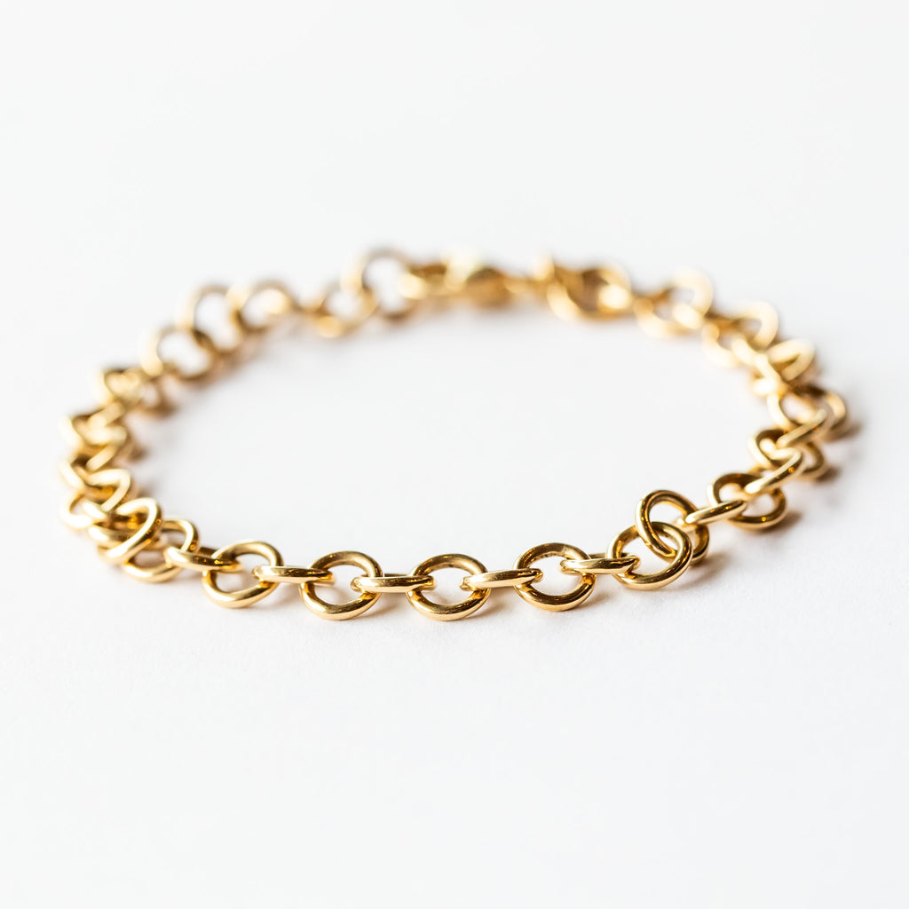 A round link gold chain bracelet.