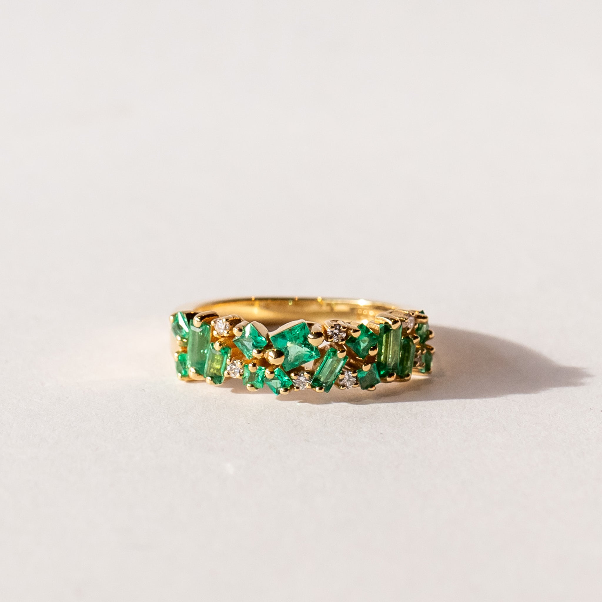 Suzanne Kalan | 18k Baguette and Princess Cut Emerald Half Band