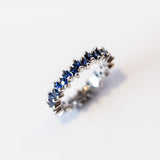 Suzanne Kalan | 18k Princess Midi Dark Blue Sapphire Eternity Band
