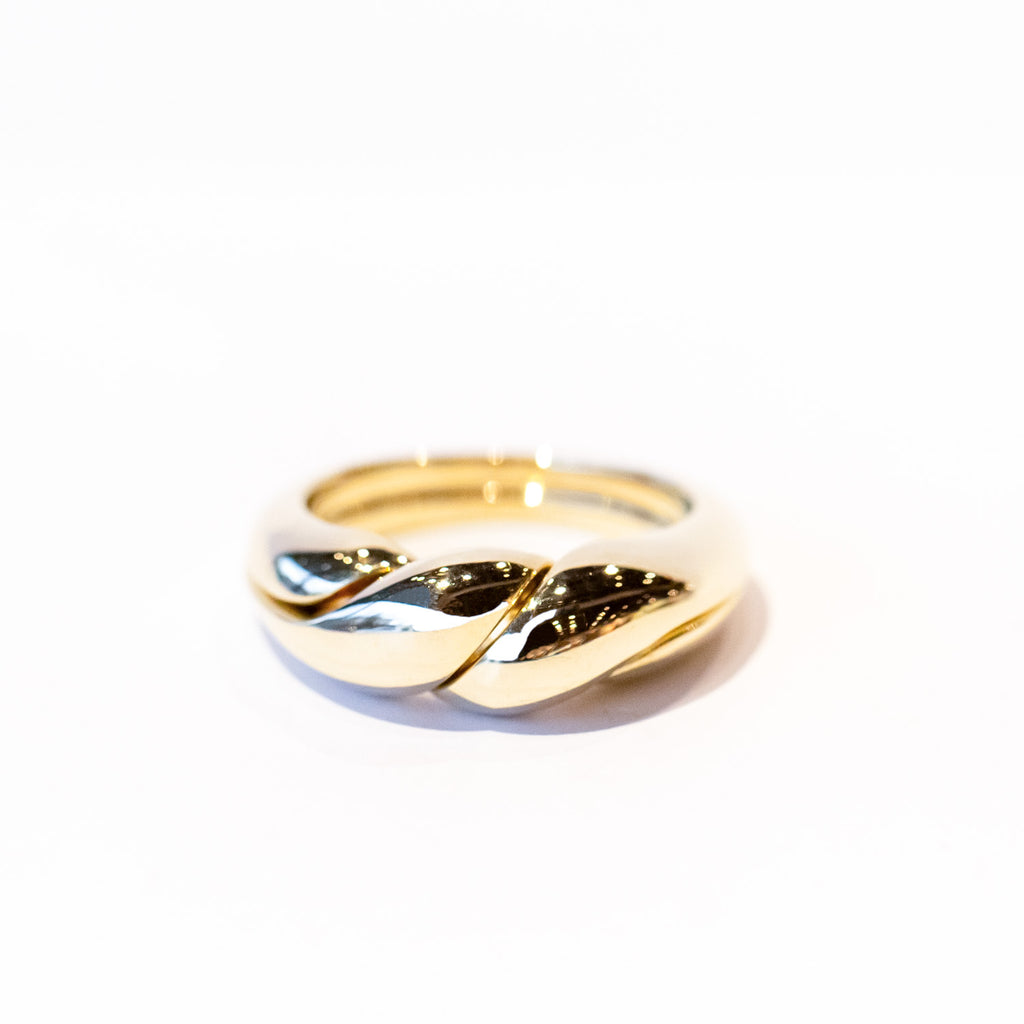 A two-part gimmel ring with a twisted design.