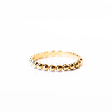 A gold band made up of bubble-shaped balls all the way around.
