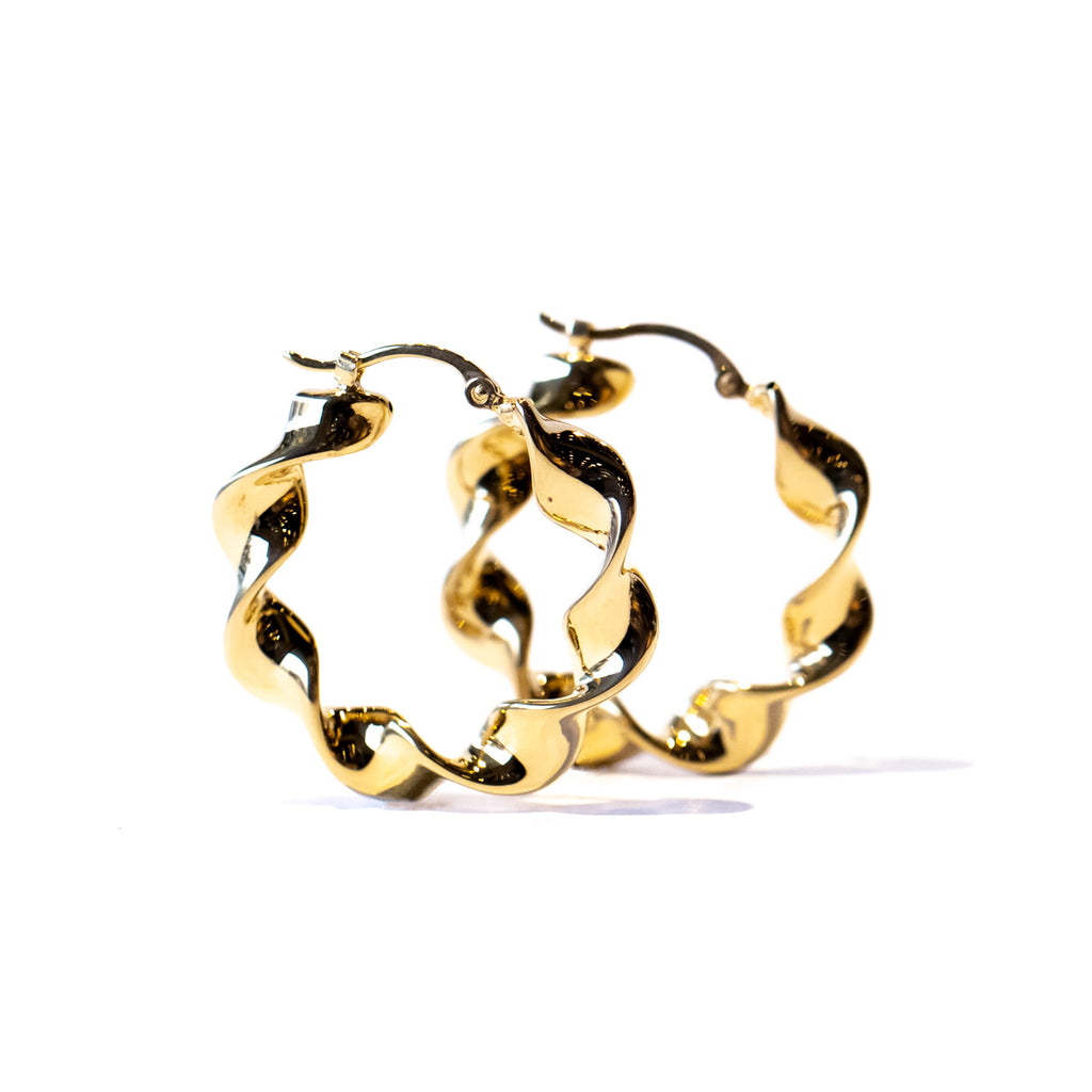 A pair of twist design gold hoop earrings.