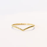 Thin hammered 18k gold contour band with hammered detail
