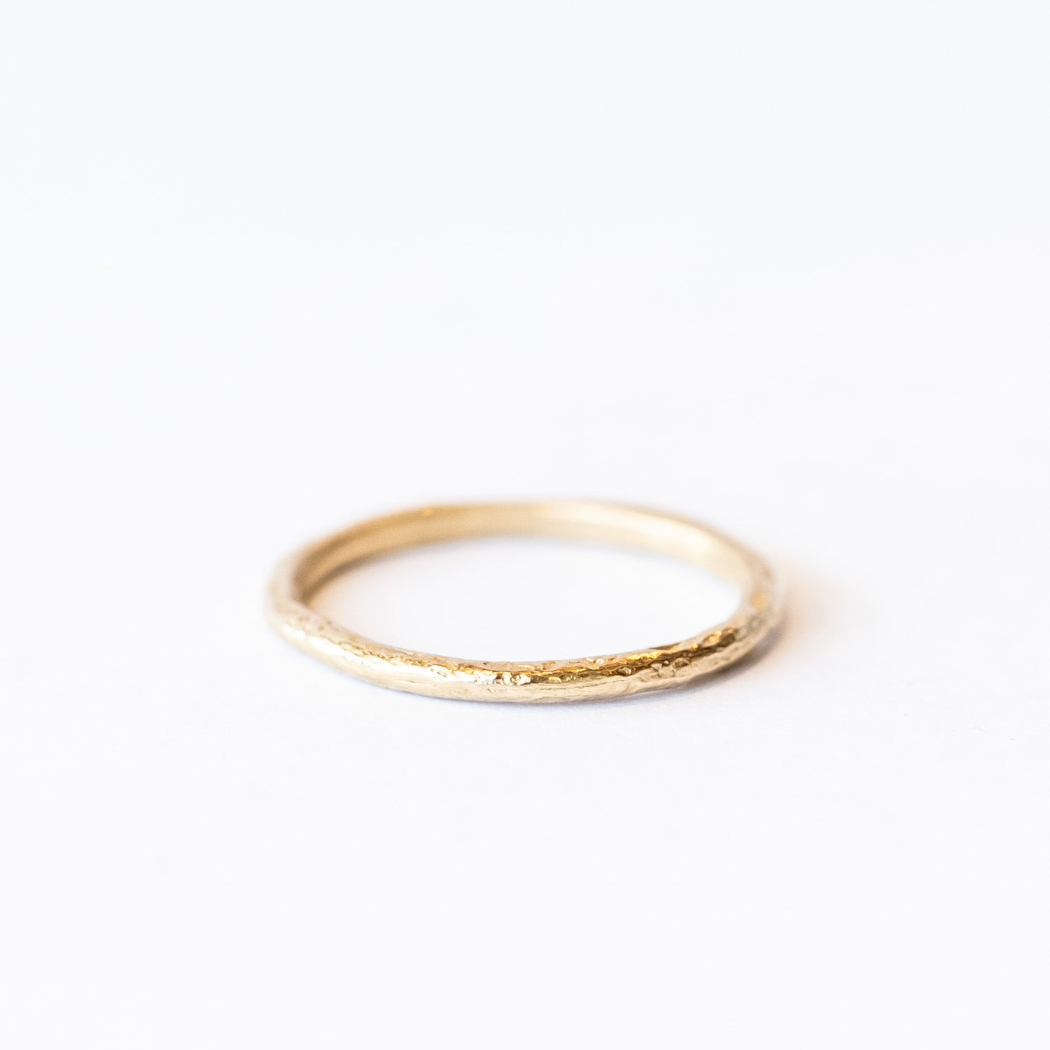 Thin Raw Gold Textured Wedding Band