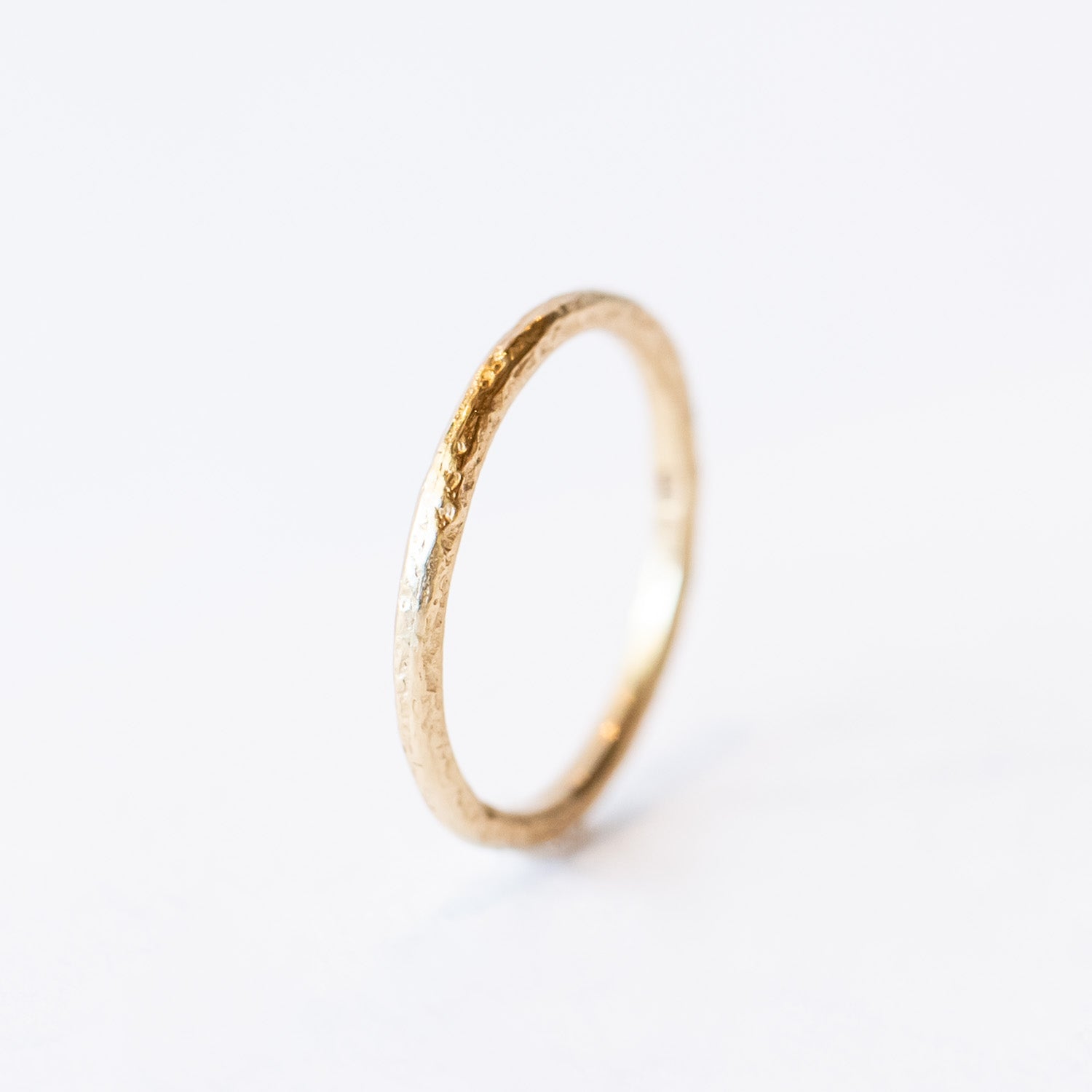 Thin Raw Gold Textured Wedding Band