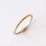 Thin Raw Gold Textured Wedding Band