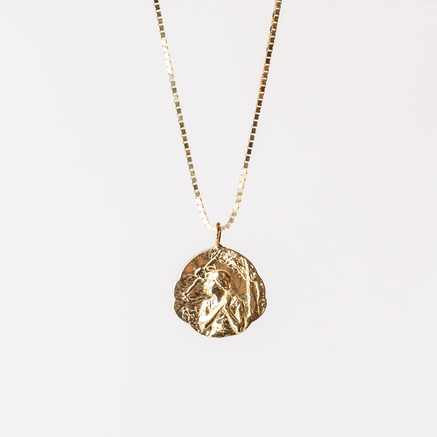 Communion by Joy carved Joan of Arc pendant necklace.
