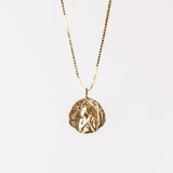 Communion by Joy carved Joan of Arc pendant necklace.