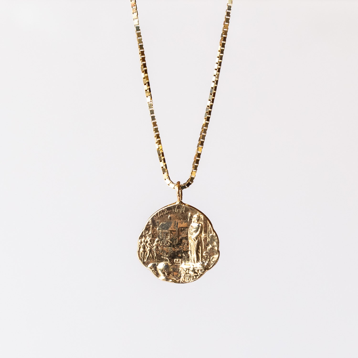 Communion by Joy carved Joan of Arc pendant necklace.
