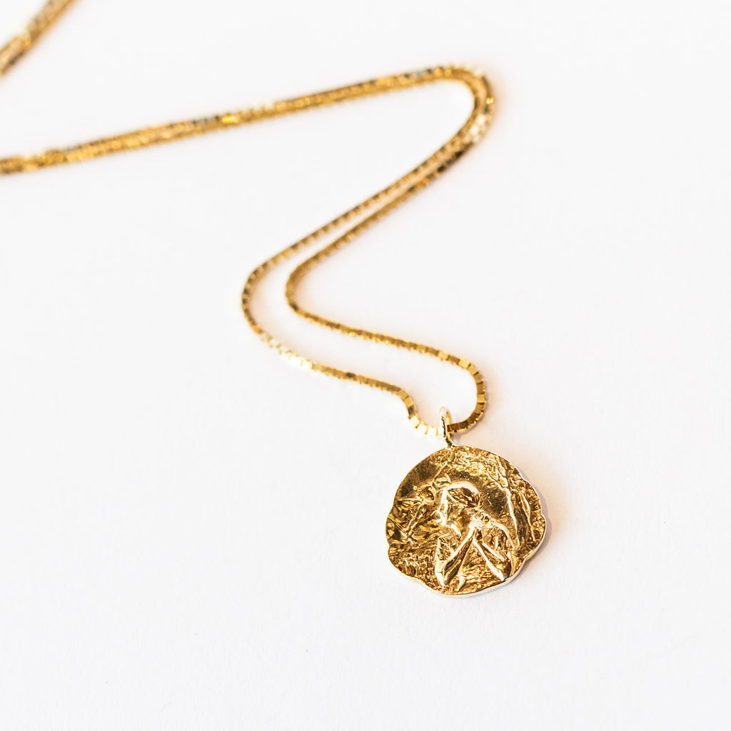 Communion by Joy carved Joan of Arc pendant necklace.