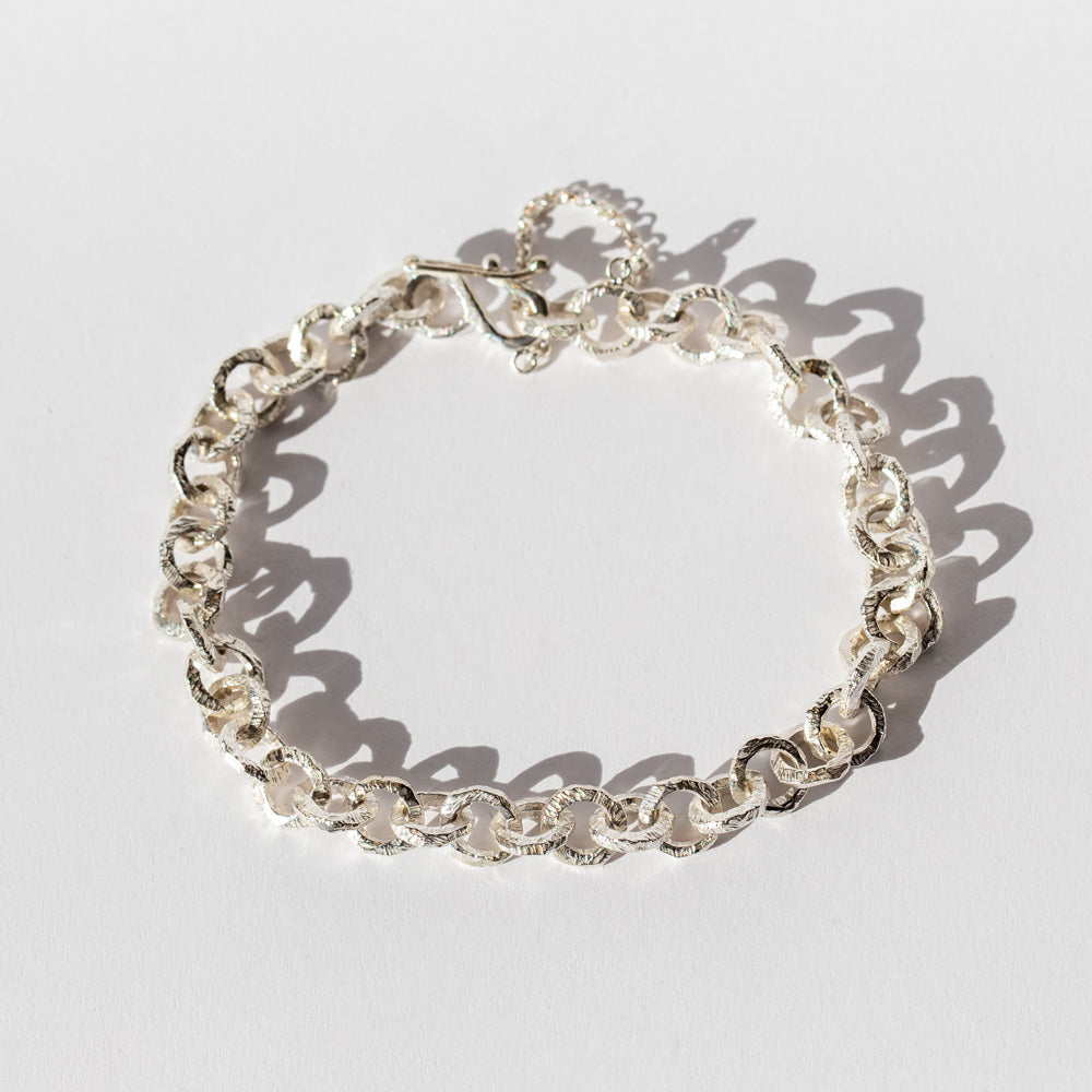Hand Carved Bracelet with Round Links