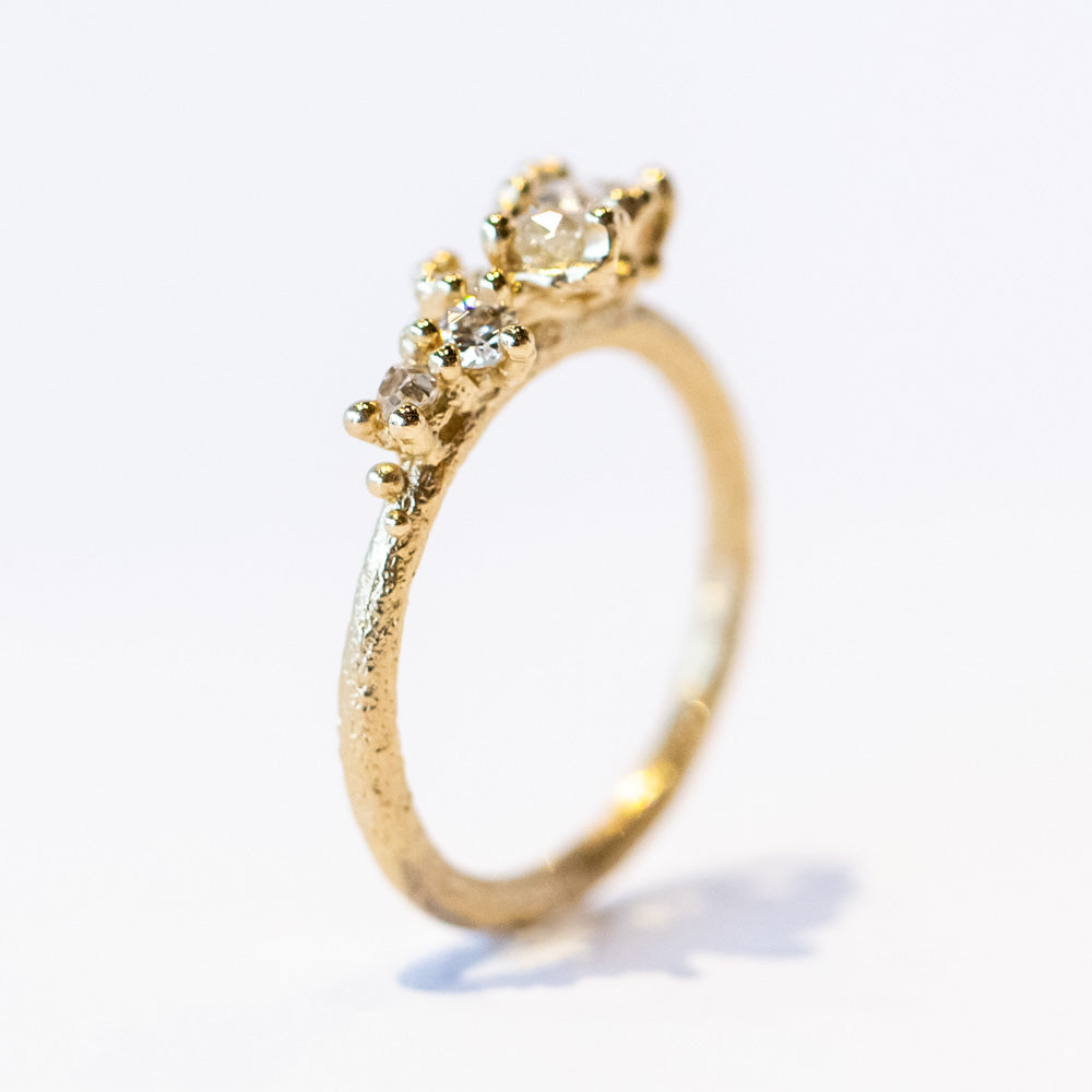 Ruth Tomlinson | Asymmetric Tapering Antique Diamond Cluster Ring