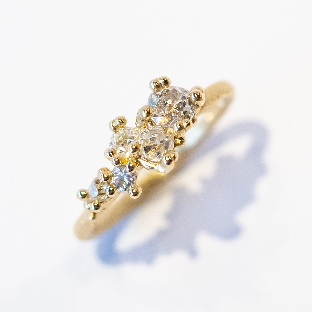 Ruth Tomlinson | Asymmetric Tapering Antique Diamond Cluster Ring