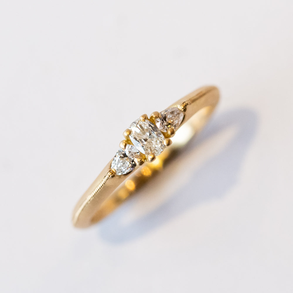 Three Stone Oval and Pear Diamond Ring
