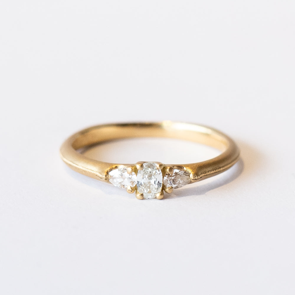 Three Stone Oval and Pear Diamond Ring