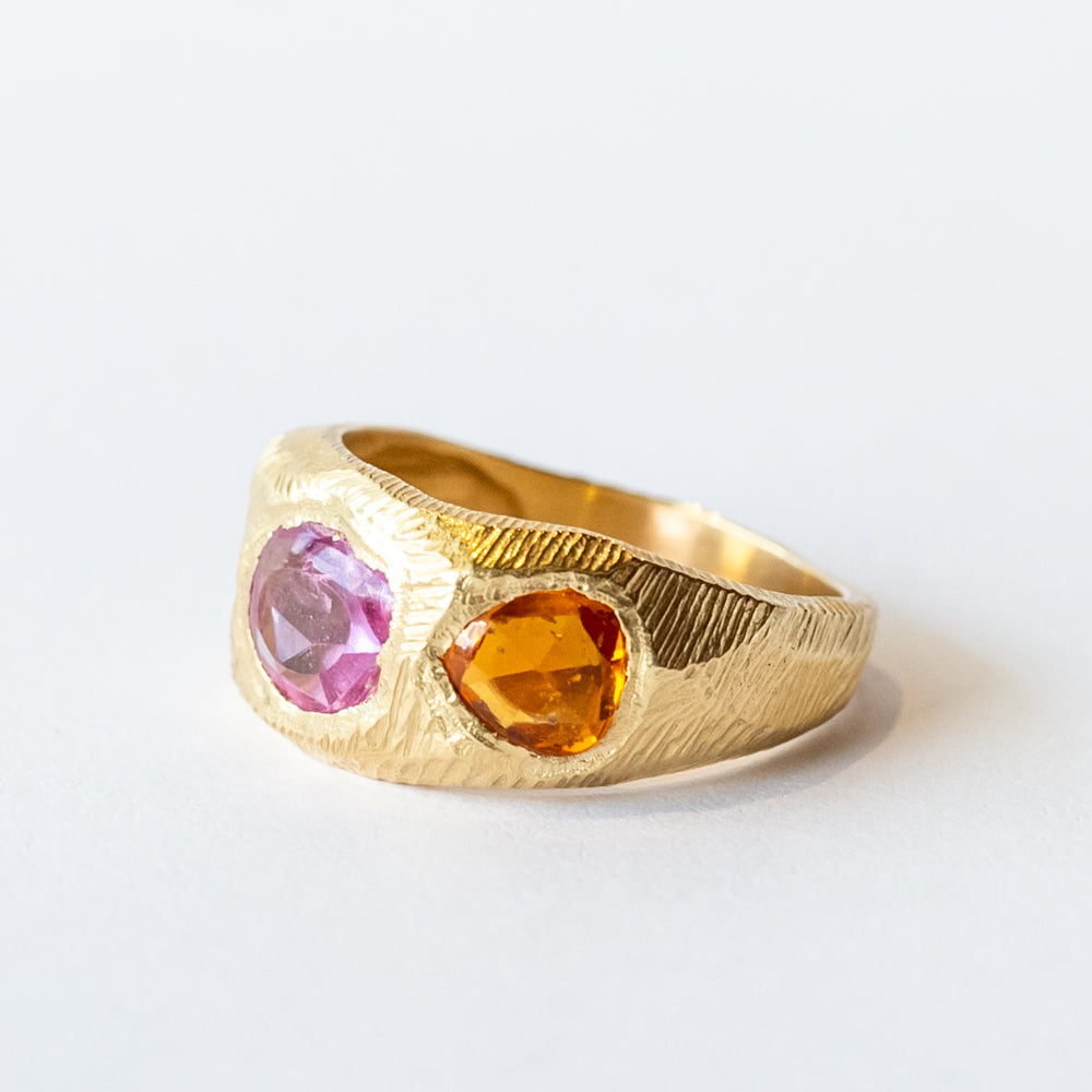 Three Stone Tapered Orange and Pink Sapphire Ring