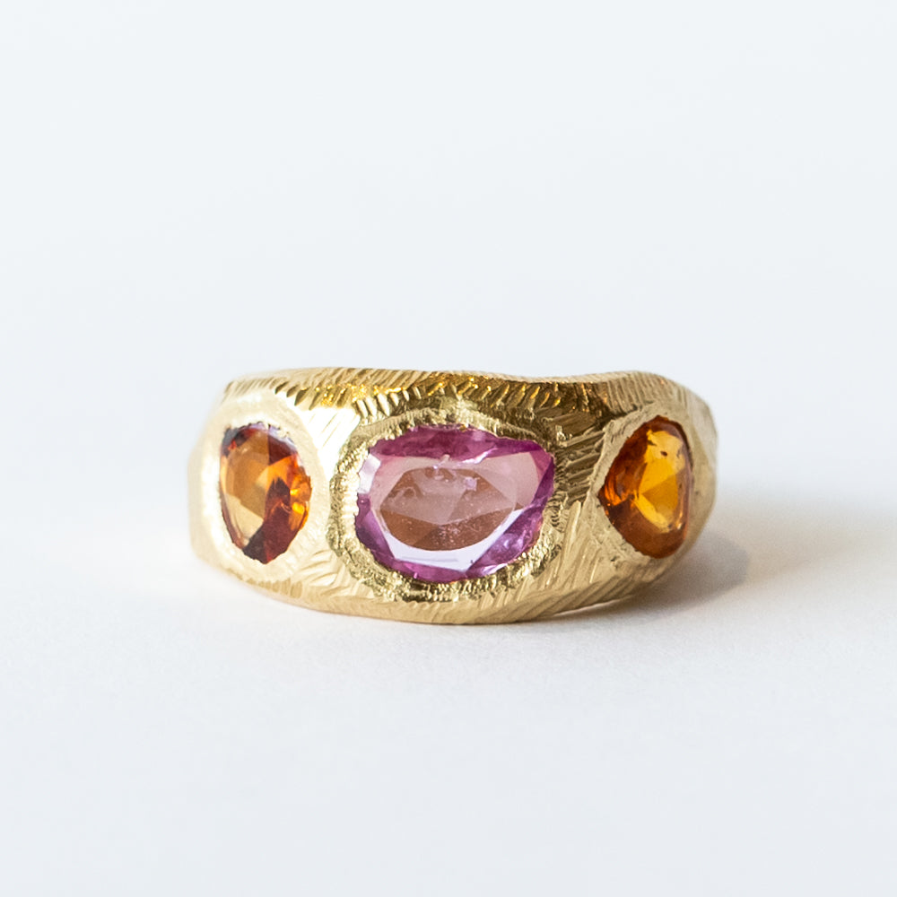 Three Stone Tapered Orange and Pink Sapphire Ring