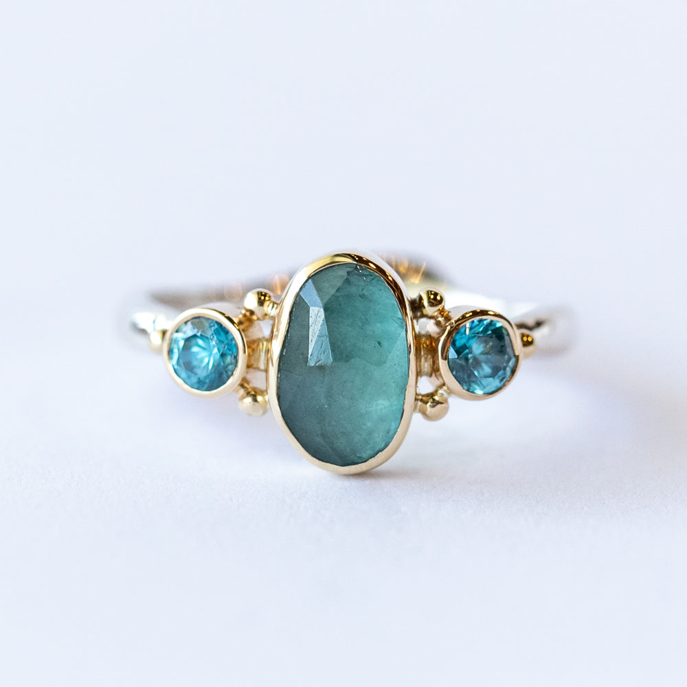 Grandiderite Ring with Blue Zircon