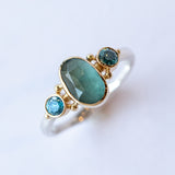 Grandiderite Ring with Blue Zircon