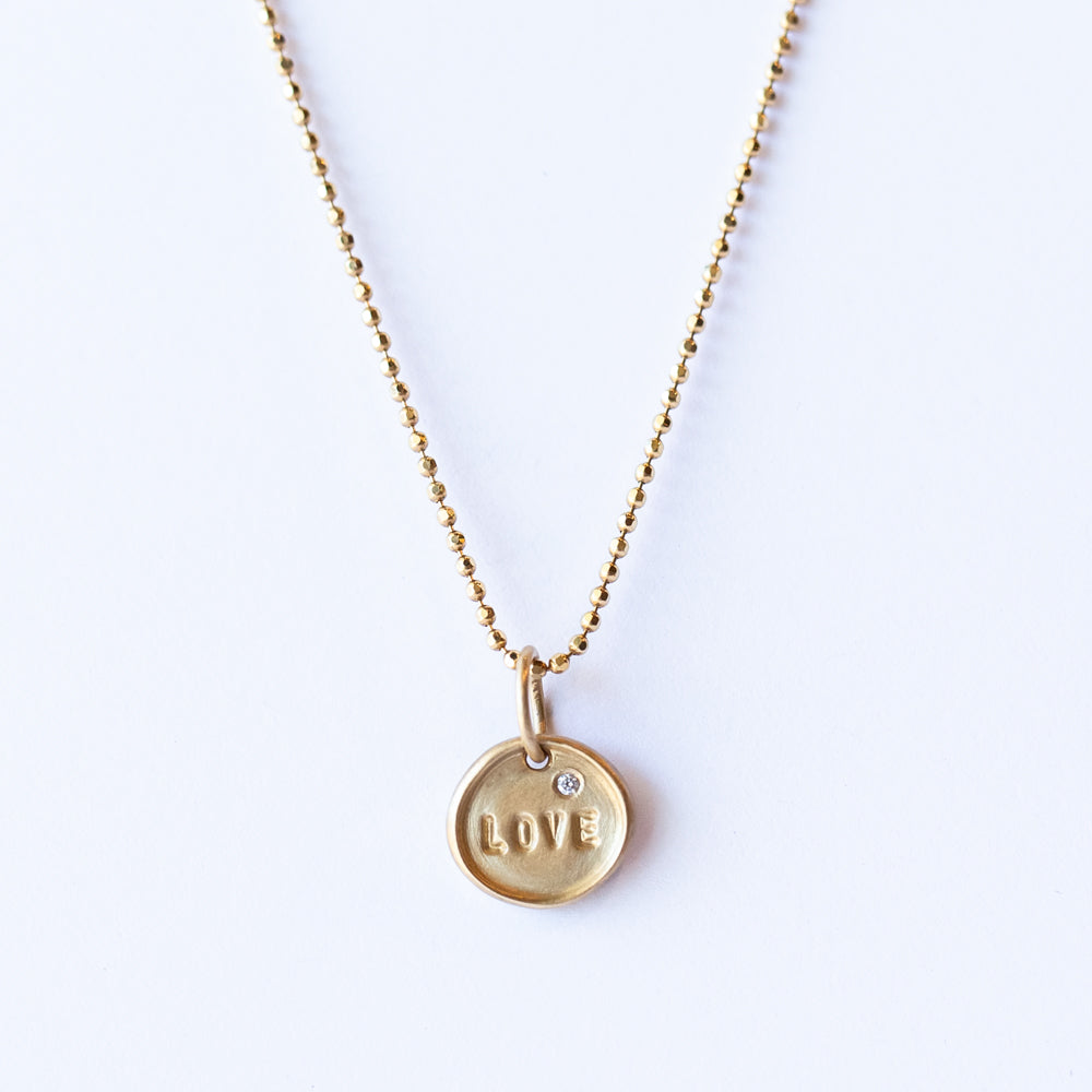 Tiny "LOVE" Disc Charm