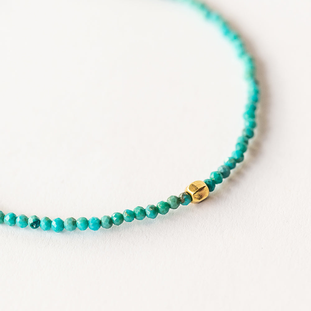 Turquoise Beaded Bracelet with Faceted Gold Bead