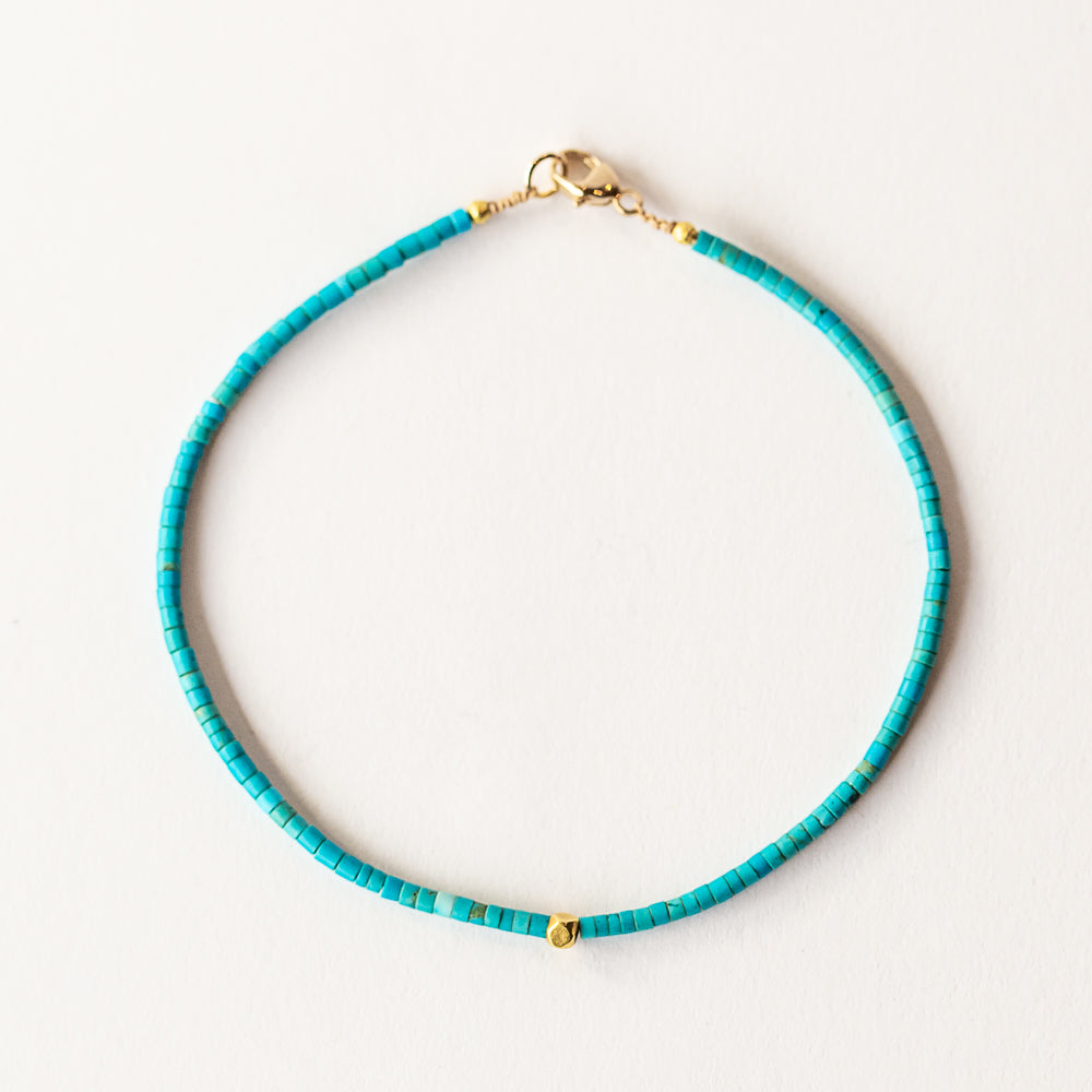 Turquoise Beaded Bracelet with Gold Cube Bead
