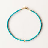 Turquoise Beaded Bracelet with Gold Cube Bead
