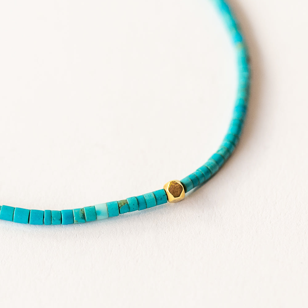 Turquoise Beaded Bracelet with Gold Cube Bead