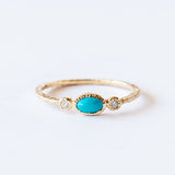 Oval Turquoise Ring with Side Diamonds