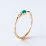 Oval Turquoise Ring with Side Diamonds
