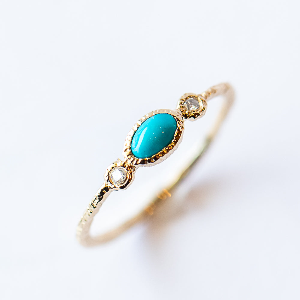 Oval Turquoise Ring with Side Diamonds
