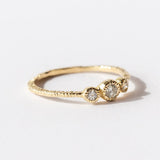 Round Diamond Three-Stone Ring