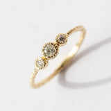 Round Diamond Three-Stone Ring