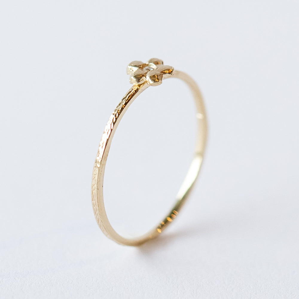 Victoria Cunningham | Tiny Flower Ring with Diamond Center