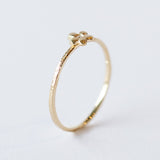 Victoria Cunningham | Tiny Flower Ring with Diamond Center