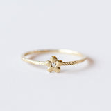 Victoria Cunningham | Tiny Flower Ring with Diamond Center