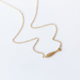 Victoria Cunningham | Tiny Fish Necklace with Diamond Eye