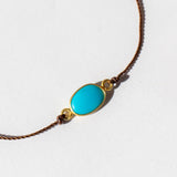 Oval Sleeping Beauty Turquoise Cord Bracelet