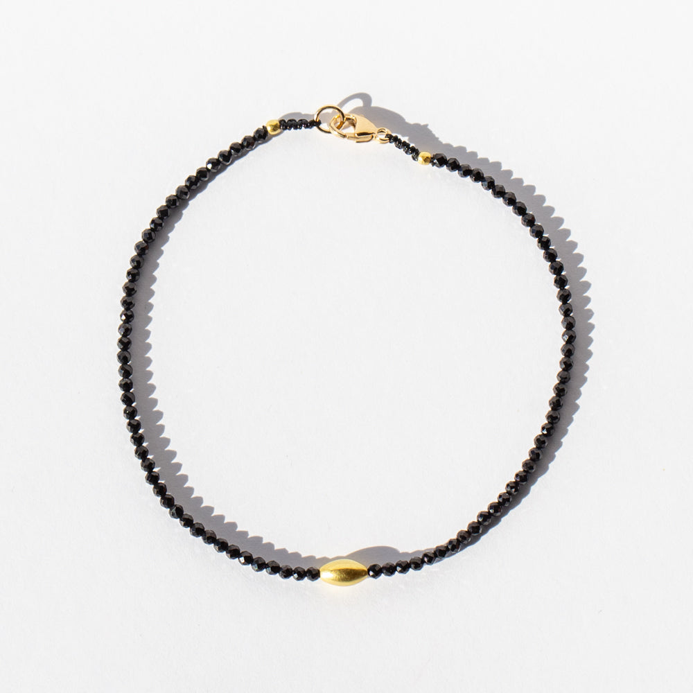 Black Spinel Beaded Bracelet with Oval Gold Bead