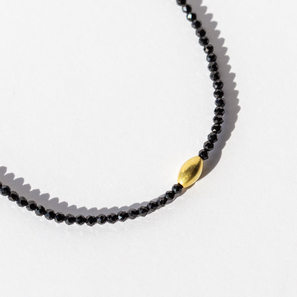 Black Spinel Beaded Bracelet with Oval Gold Bead