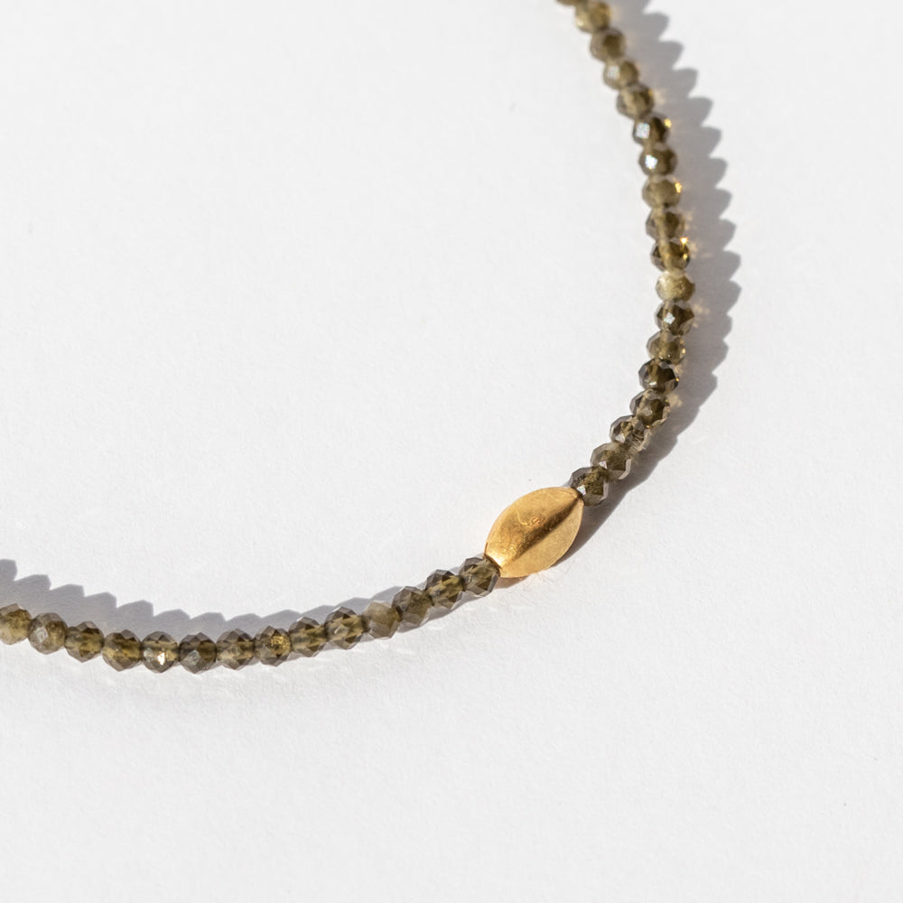 Dark Gray Cats Eye Beaded Bracelet with Oval Gold Bead