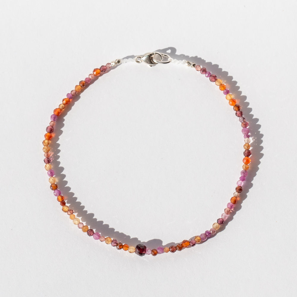Pink and Orange Beaded Bracelet with Garget Bead