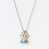 Turquoise Cluster Necklace with Open Disc Charms