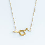 Engraved Snake Necklace with Diamond Eyes