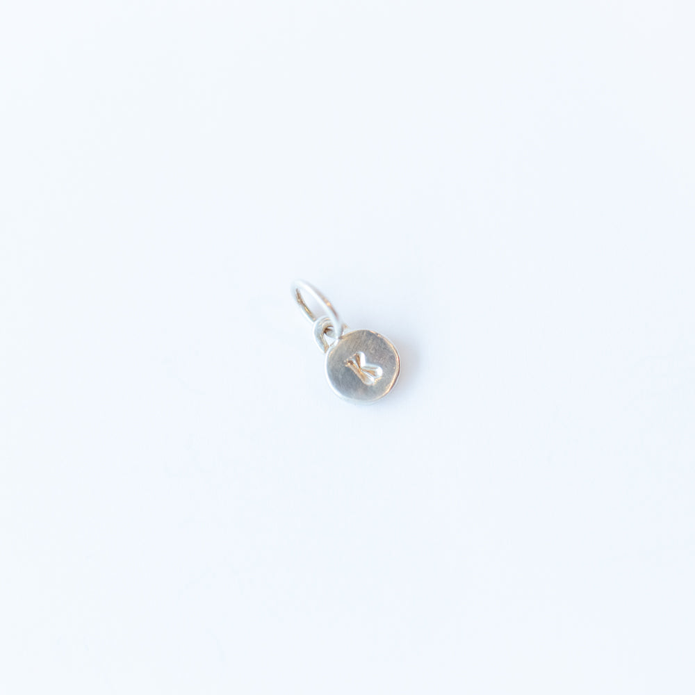 Itty Bitty "K" Disc Charm