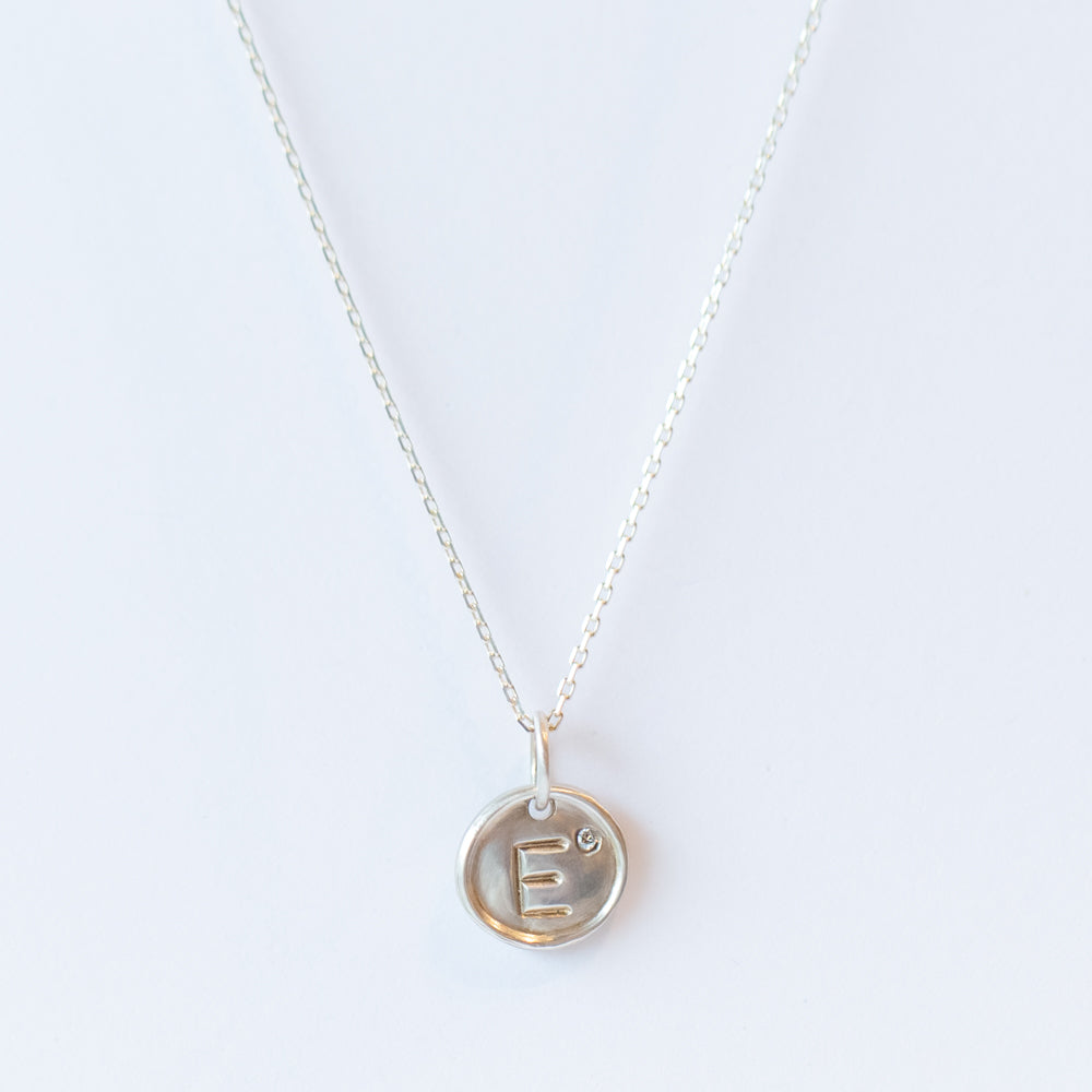 Tiny Disc Letter Charm with Diamond